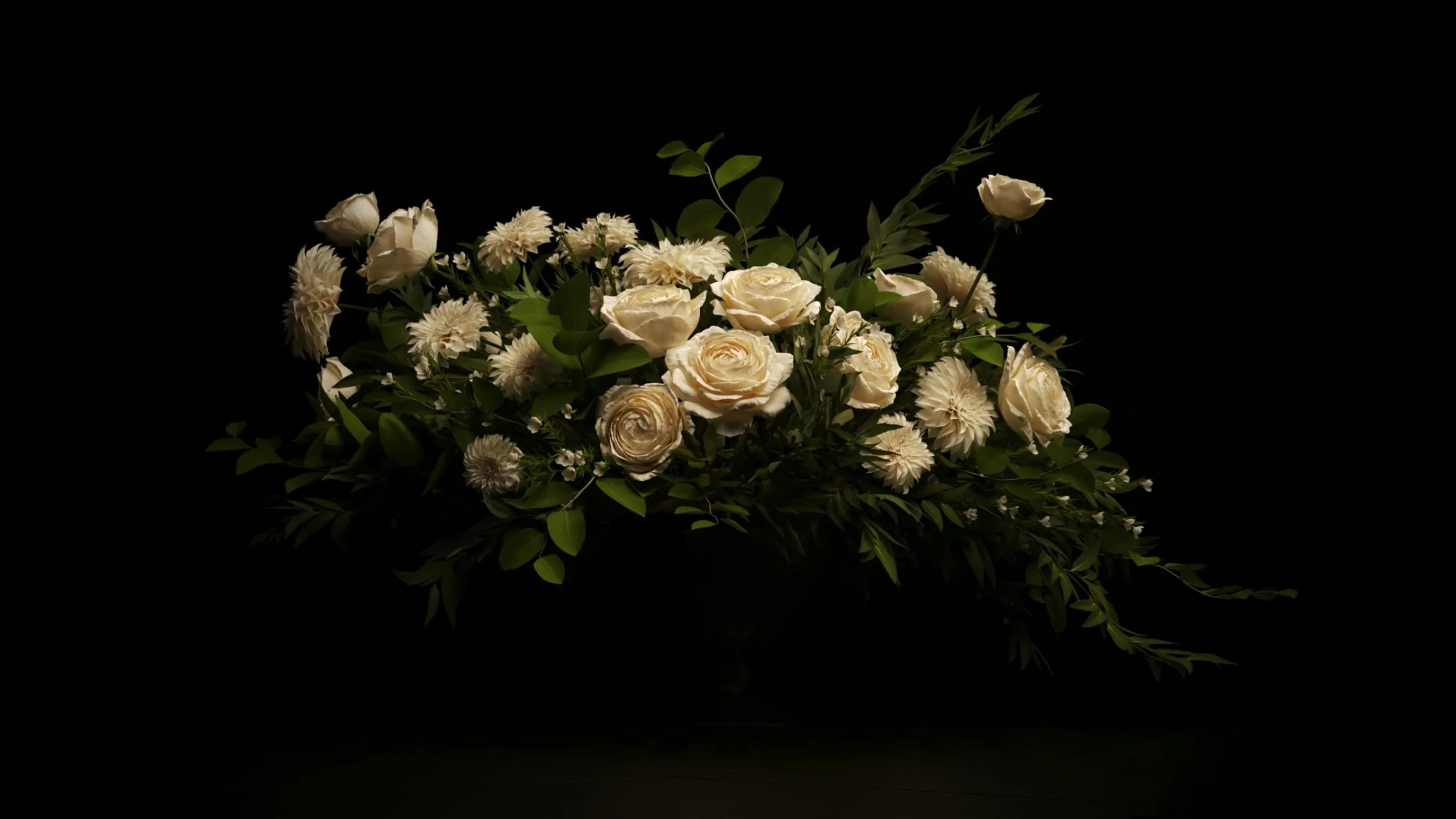 Bouqet of white flowers on dark background